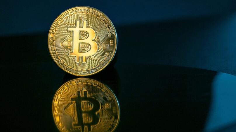 Bitcoin coin or cryptocurrency on dark background, concept financial picture