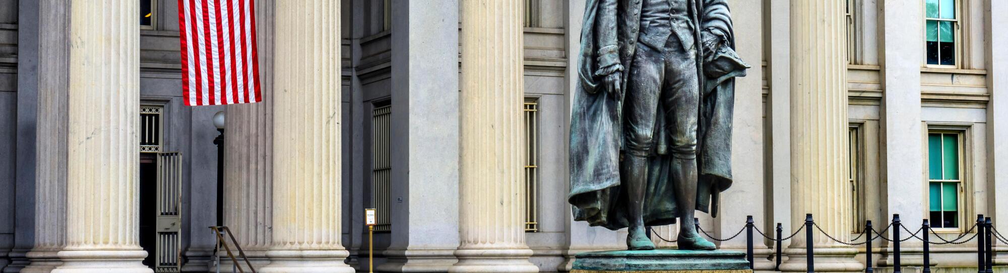 Albert Gallatin Statue US Flag US Treasury Department, Washington DC. Statue by James Fraser and dedicated in 1947.