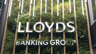 LLOYDS Banking Group brand name mounted on a decorative artificial living wall inside the company?s London head office - sustainable, modern design