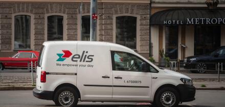 Picture of a sign with the logo of Elis on a vehicle of the firm in Riga. Elis is a French company, founded in 1969 and specialized in the field of cl