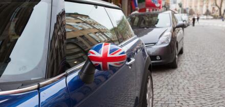 A Mini Cooper with the English flag on the mirror, Stockholm, Sweden.