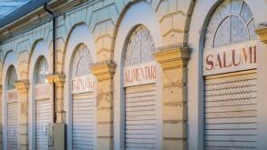 Traditional italian food stores: cheese, cured meat etc... crisis, shops with lowered shutters
