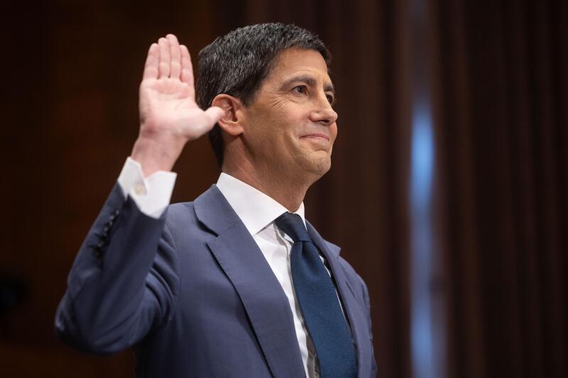 Kevin Warsh, nominee for Federal Reserve chair, is sworn in to testify during his confirmation hearing before the Senate Banking Committee on Capitol Hill on April 21, 2026. (Francis Chung/POLITICO via AP Images)