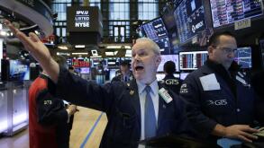 New York, United States. 12th Mar, 2020. Traders work on the the floor of the New York Stock Exchange at the opening bell on Wall Street in New York City on Thursday, March 12, 2020. U.S. stocks recovered some of their steep losses on Thursday after the F