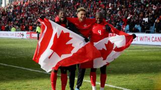 Soccer Football - World Cup - CONCACAF Qualifiers - Canada v Jamaica - BMO Field, Toronto, Canada - March 27, 2022 Canada players celebrate after qualifying to the World Cup 2022 REUTERS/Carlos Osorio