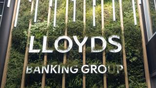 LLOYDS Banking Group brand name mounted on a decorative artificial living wall inside the company?s London head office - sustainable, modern design