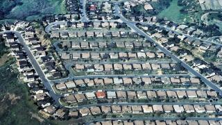 An aerial view shows side-by-side homes that are crammed into this housing development among foothills in San Diego County in Southern California, USA. Such jam-packed suburban neighborhoods are common there because of the popularity of that southernmost 