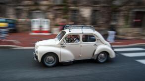 Classic car Renault 4CV during the Embouteillage de la Route Nationale 7, happening for antique cars at Lapalisse, France