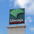 Sign over Unicaja bank, Torremolinos, Spain