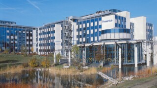 Reflection of medical building in water, Fresenius Medical Care AG, Frankfurt, Germany