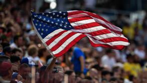 A football fan waves a U.S. flag in the Group F match between Sweden and South Korea during the FIFA World Cup 2018 in Nizhny Novgorod, Russia, 18 Jun