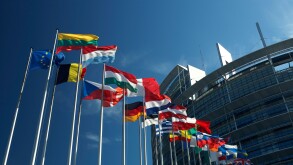 Flag poles with flags of the European Union countries blow before the building of the European parliament in Strasbourg, France
