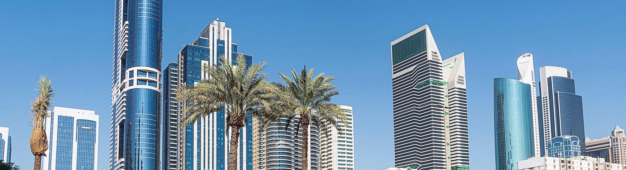 Tall skyscrapers against the blue sky. Dubai. UAE
