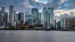 Modern skyscrapers of Canary Wharf viewed from the Thames River. London, UK, 14 October 2023
