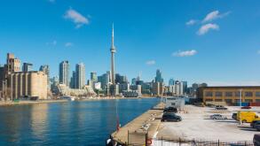 The Toronto skyline from the Billy Bishop Toronto City Airport overlooking the parking lot. Toronto, Ontario, Canada.