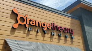 Sign with logo on facade of Orangetheory Fitness gym in Dublin, California, July 30, 2019. ()