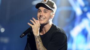 Justin Bieber performs on stage during the Capital FM Jingle Bell Ball 2015 held at The O2 Arena, London. 
Photo credit should read: Doug Peters EMPICS Entertainment
