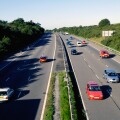 Traffic in the early morning light on the M4 in South Wales UK GB