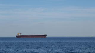 Copenhagen, Denmark - August 6, 2015: A container ship sailing towards Copenhagen harbour.