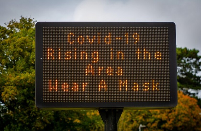 covid_19_sign_case_rising_July19.jpg