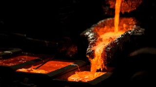 Molten metal at aluminium foundry. Master alloys