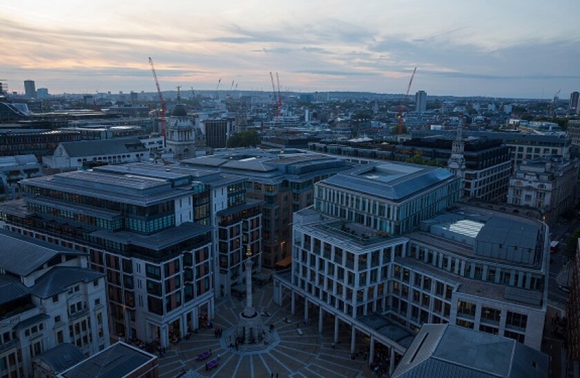 Paternoster Square in London, England, as seen from the top of St. Paul's Cathedral at dusk.