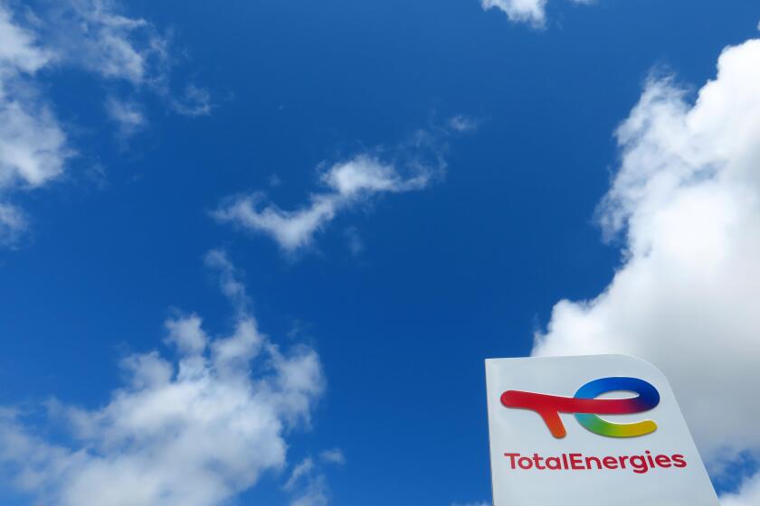 The logo of French oil and gas company TotalEnergies is seen at a petrol station in Ressons, France, August 6, 2021. REUTERS/Pascal Rossignol