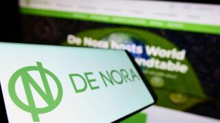 Smartphone with logo of Italian company Industrie De Nora S.p.A. on screen in front of business website. Focus on left of phone display.