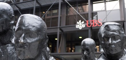 UBS headquarters at Broadgate, London, with the striking 'Rush Hour' sculpture by George Segal prominently displayed in the foreground, London, UK