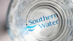 Southern Water bill with a glass of water