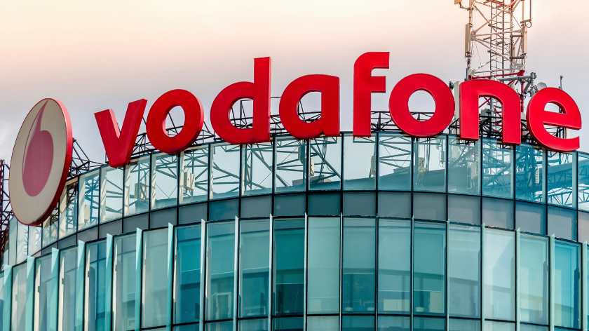 Vodafone office buiding in Bucharest. Logo of the British multinational telecommunications company Vodafone.