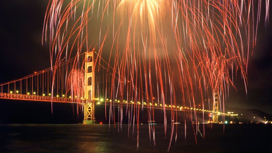 Fireworks and the Golden Gate Bridge during the 50th anniversary celebration of the opening of the bridge.