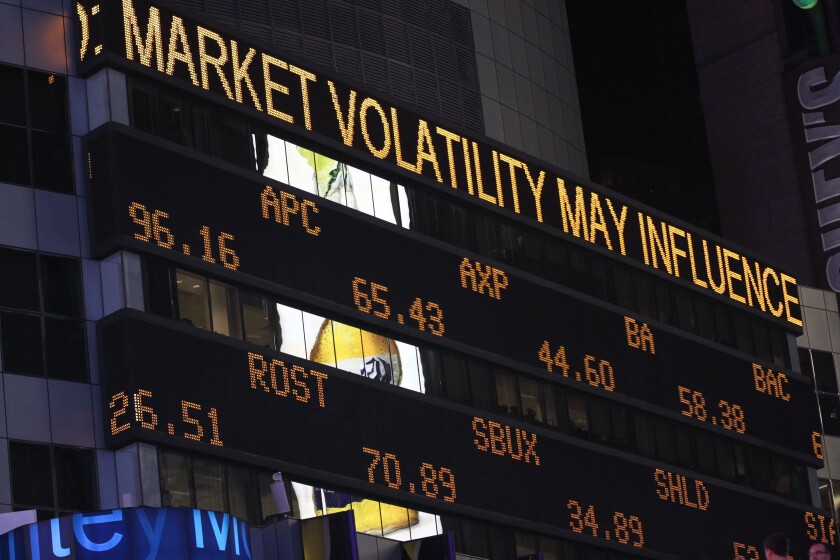 Illuminated stock market board in New York City