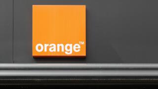 Orange logo on a wall