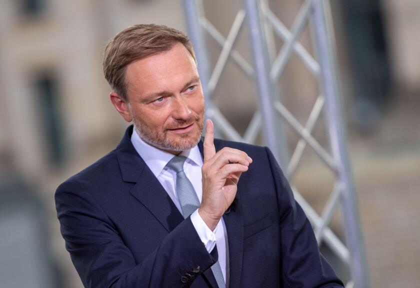 25 July 2021, Berlin: Christian Lindner, party leader of the FDP, speaks at the ARD summer interview on the terrace of the Marie-Elisabeth-Luders-Haus. Photo: Christophe Gateau/dpa