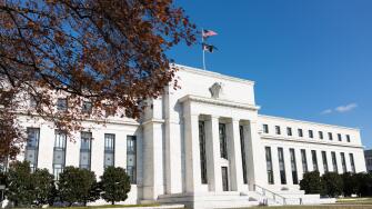 Federal Reserve Building Entrance Washington DC // The entrance to the Federal Reserve building on Constitution Avenue in Washington DC. The Federal Reserve System is the central banking system of the United States.