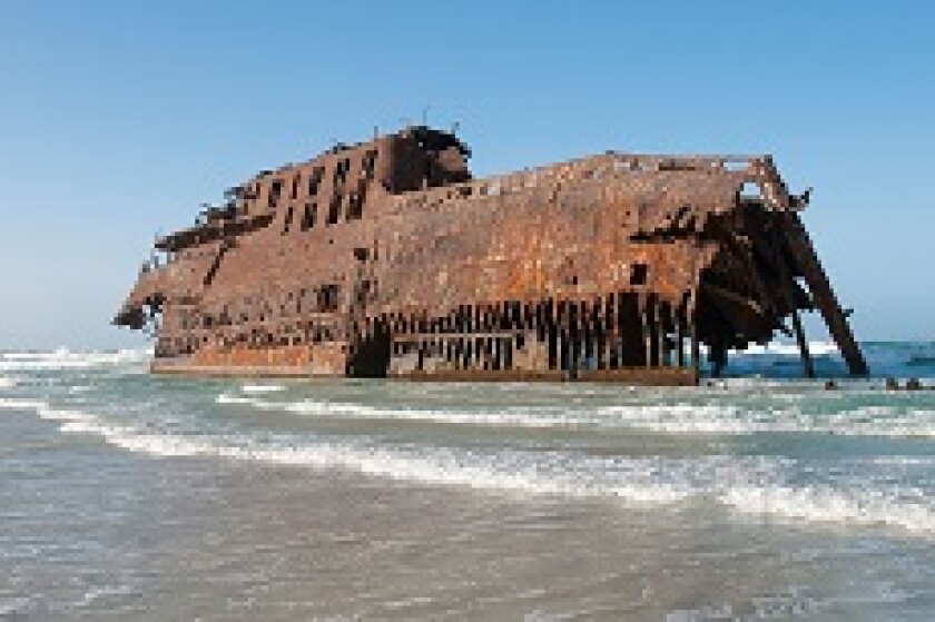 Ship wrecked stranded on beach from Alamy 230x150
