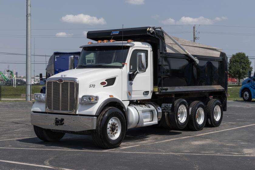 Indianapolis - August 1, 2023: Navistar International Semi Dump Truck display at a dealership. Navistar International is subsidiary of Traton.