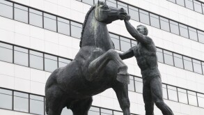 Statue in front of the BCP Millenium bank headquarters in Porto, Portugal