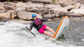 Stand up paddleboarder falling in white water. Image shot 09/2014. Exact date unknown.