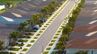Wealthy neighborhood with expensive houses in southern Florida. Development of US premium housing market