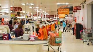 Checkout points and staff in a Sainsburys supermarket