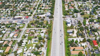 Aerial view of highway through residential area, Florida, United States