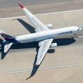 Aerial view of LATAM Airlines Boeing 767 CC-CXE departing LAX airport bound for Santiago (SCL), Chile. Widebody long haul aircraft seen from above.