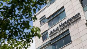 A logo sign outside of a facility occupied by the Janus Henderson Group in Denver, Colorado, on July 23, 2018.