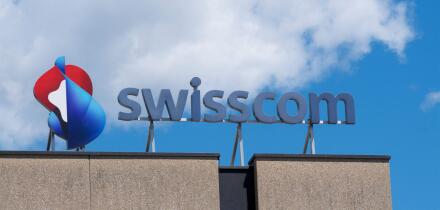Locarno, Ticino, Switzerland - 17th July 2020: Swisscom logo sign hanging on the top of a building in Locarno, Switzerlad. Swisscom is is a major tele