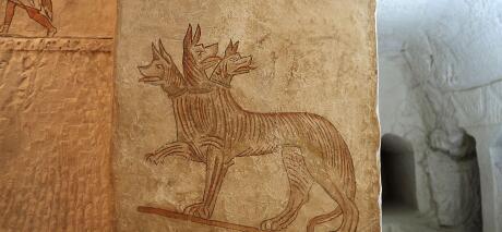 Mystical and ordinary animals on the wall in the family tomb in ancient city Maresha. Cerberus.