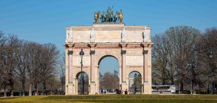 Arc de Triomphe du Carrousel on a sunny spring day in Place du Carrousel, Paris, France