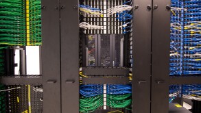 Ethernet cables and sockets neatly arranged in the server racks of a data center at some Hong Kong serviced offices.