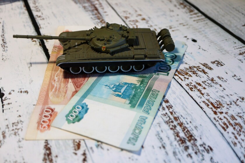 Toy,Tank,On,The,Russian,Banknote,5000,And,1000,Roubles
